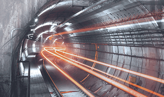 Image from a gray lighted tunnel