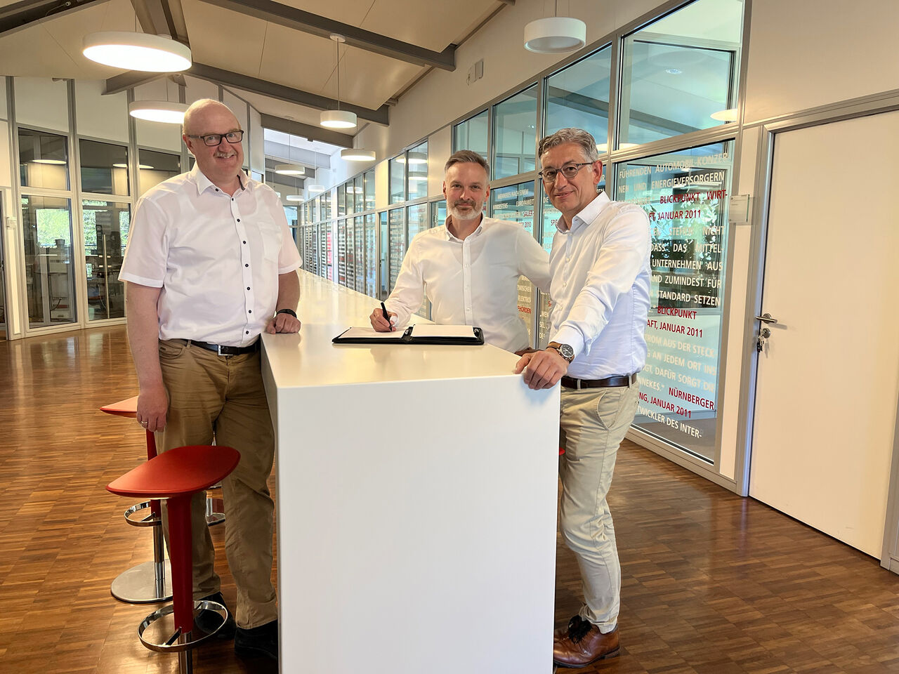 Photo of contract signing